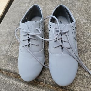 Gray dance type shoes